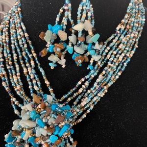 Multi layered beaded necklace and matching earrings
